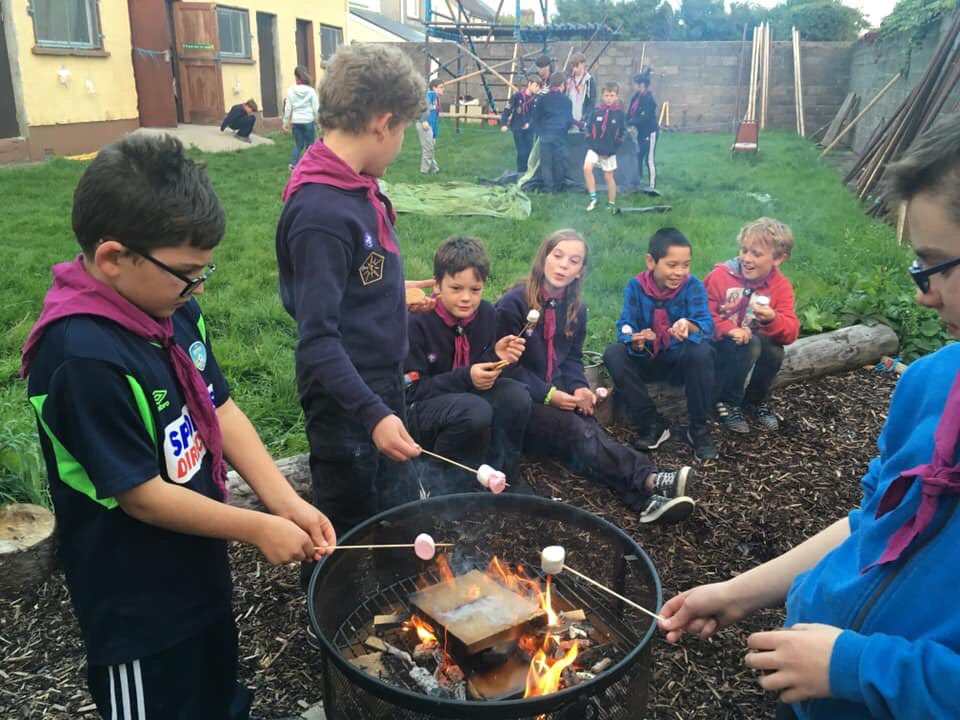 Monday Night Cubs learning the scout essentials in the hall tonight: tent pitching and smores!!! #ScoutsIE