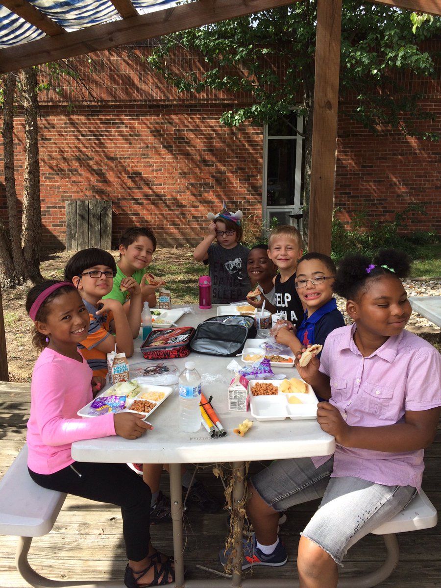 We celebrated reaching individual goals by eating in the courtyard.