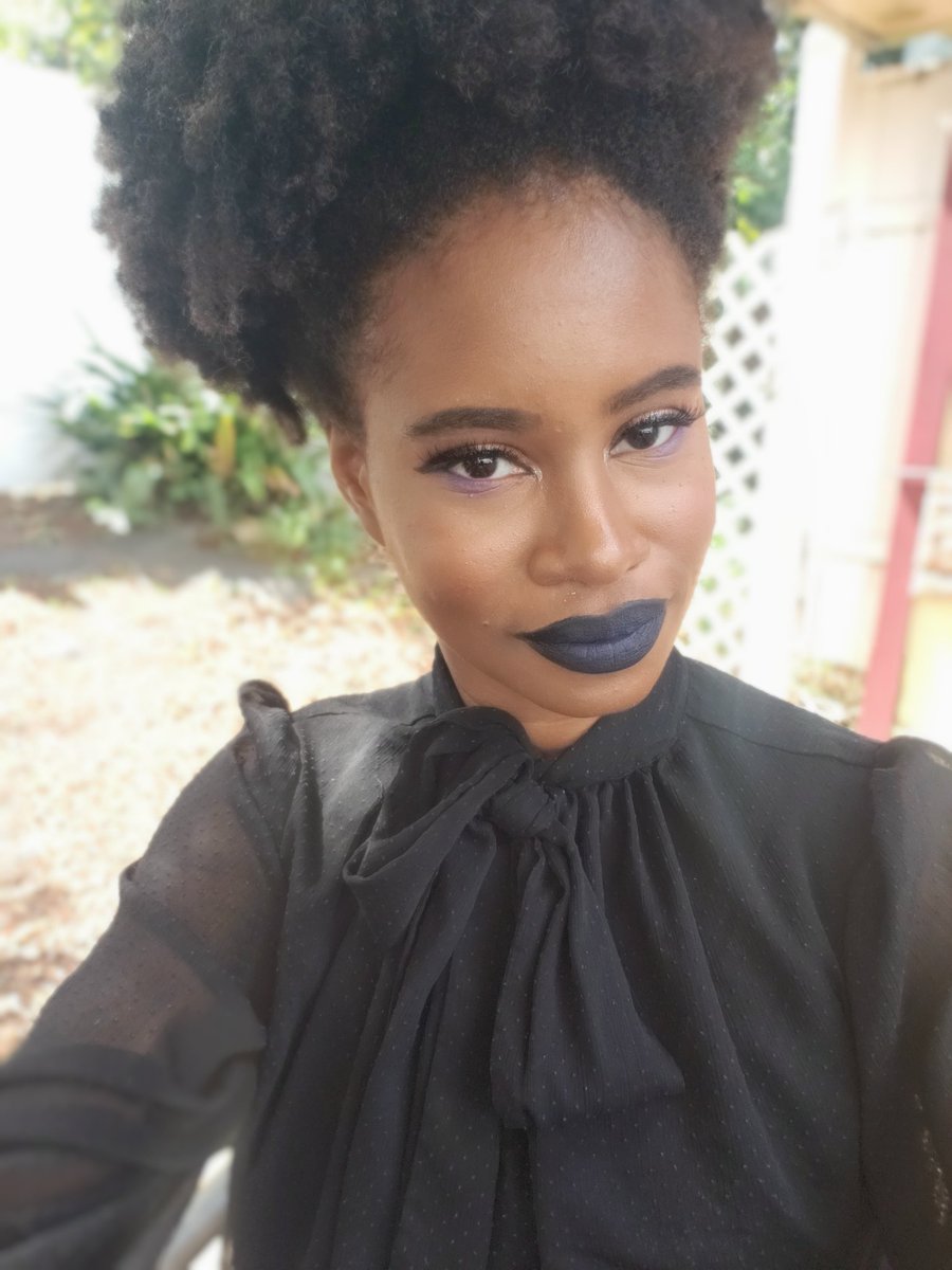 alamanecer's tweet photo. When it's Spooky Season so the skulls &amp; black fur have to match your #Marvel10 office theme 😂

lips: #UNINVITED (applied questionably) https://t.co/tYSYdAWYgm