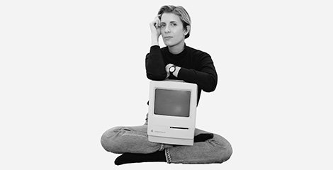 Claire L. Evans with Apple Mac