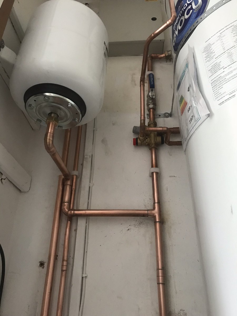 plumbedwright's tweet photo. Old gravity fed #cylinder removed and s new #invented cylinder installed. Also a tidy up of the cupboard pipe work. https://t.co/uGx9RWYQkL