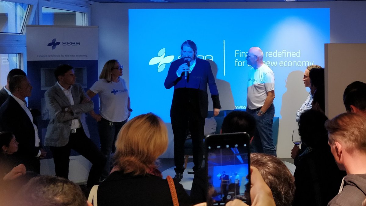 UrsBolt's tweet photo. Great to see @BitcoinSuisseAG CEO @nikolajsen_BTCS to congratulate new player #SEBAcryptoAG CEO #GuidoBuehler on the new #crypto #banking venture!
#CryptoValley #Zug #Switzerland https://t.co/D5daFGOb7z