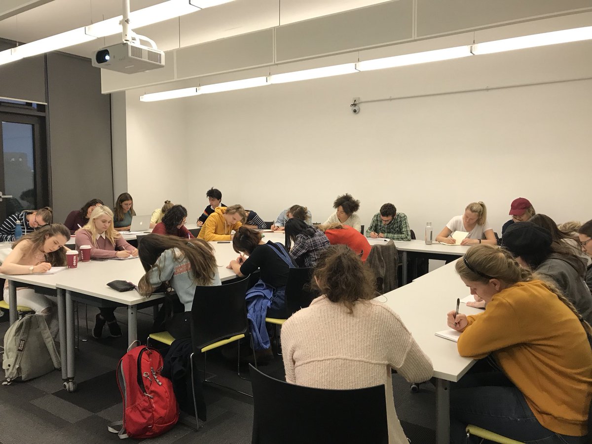 exeterwriting's tweet photo. Our first workshops of the year! A massive turnout for our prose writing session. Heads downs and pens flying across the page #eucws https://t.co/6SsxrQjLRr