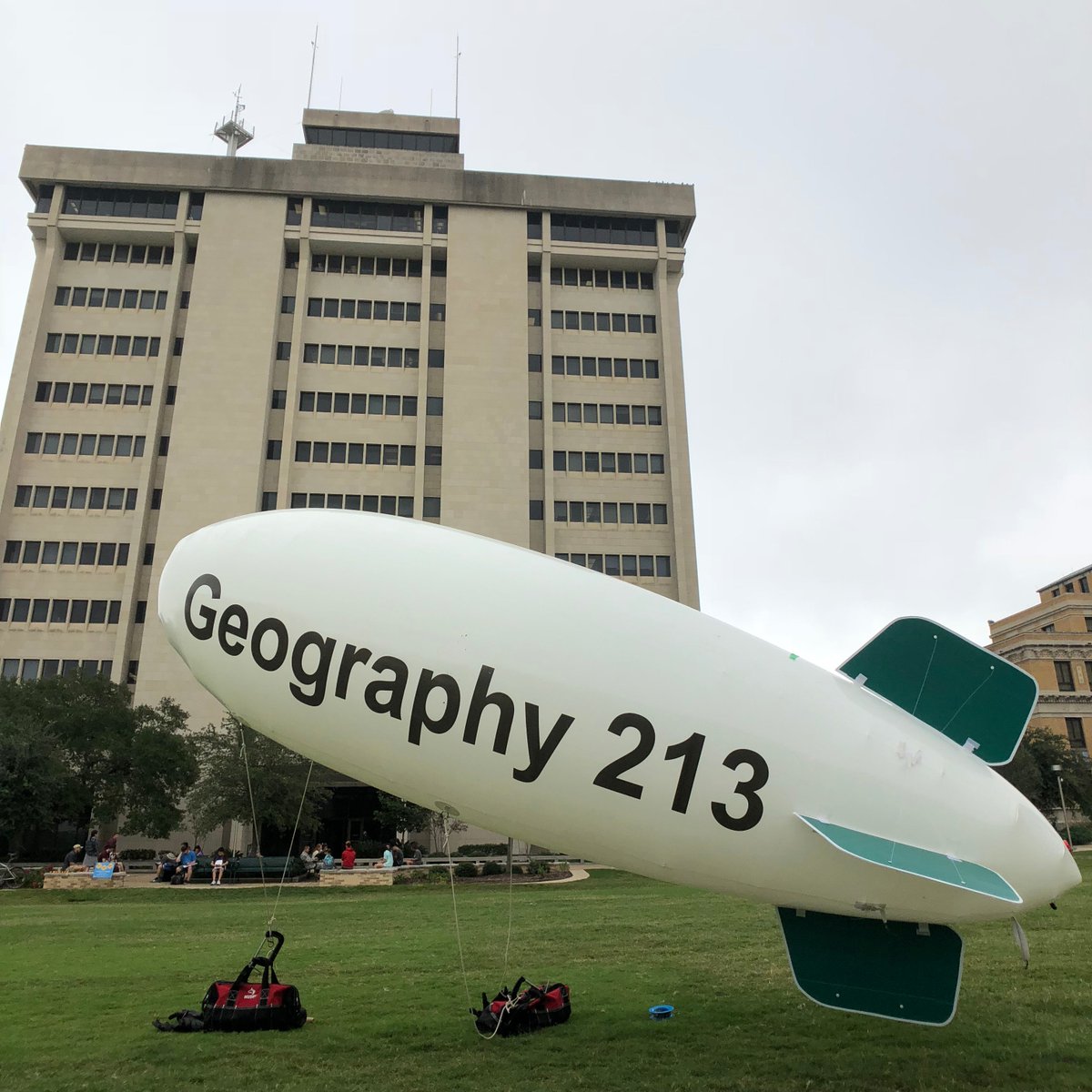 blimp outside on the ground outside of the O&M building