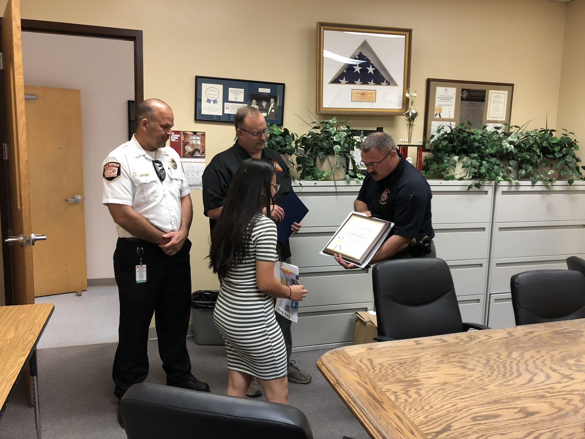 Battecm's tweet photo. Fire Science Academy student receiving her 1st place award for @NevadaDPS fire prevention week poster contest! She will have her poster on billboards all over @ClarkCountyNV and @NVGovernment https://t.co/6WrWuZRkKa