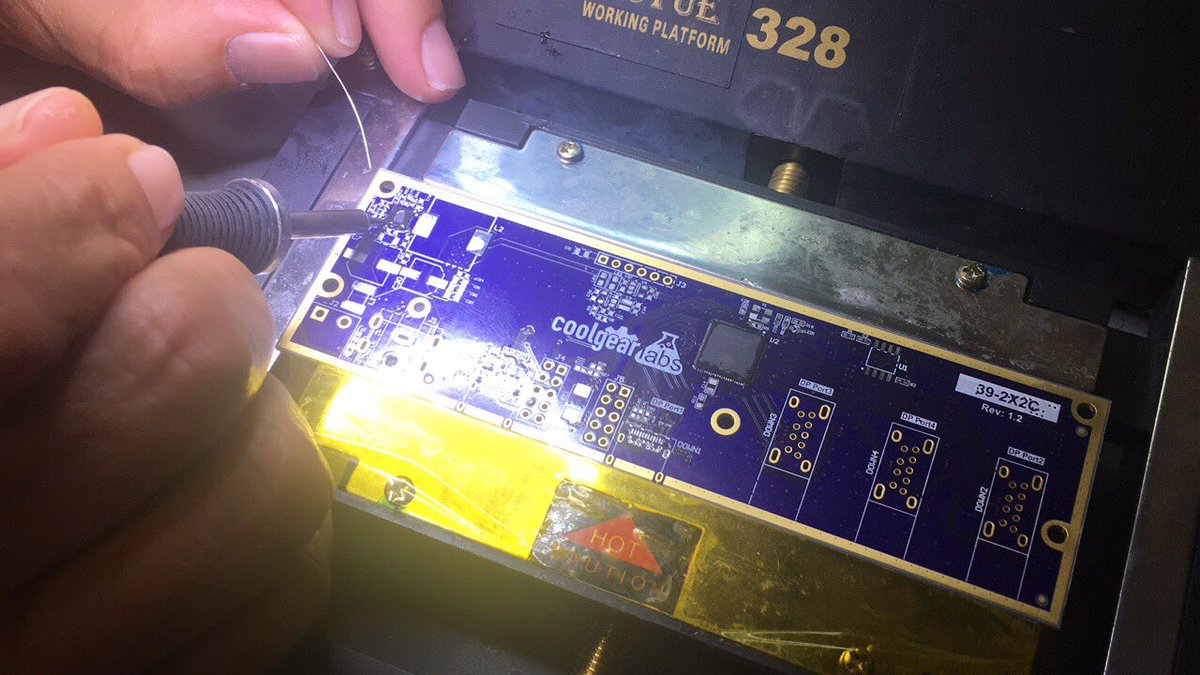 Watching one of our <a href="/CoolgearLabs/">Coolgear Labs</a> engineers use a microscope to solder Transient Voltage Suppressors onto a circuit board. That's one on the tip of his finger! #Technology is cool. #microcircuits #RandD