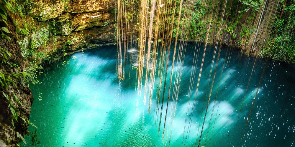 Expedia's tweet photo. Dive into the Yucatán Peninsula's luminous, subterranean world and explore the cavernous pools known as cenotes with Expedia Labs' new VR experience: https://t.co/uqHjyzqI8j https://t.co/JfxTlAtf1a