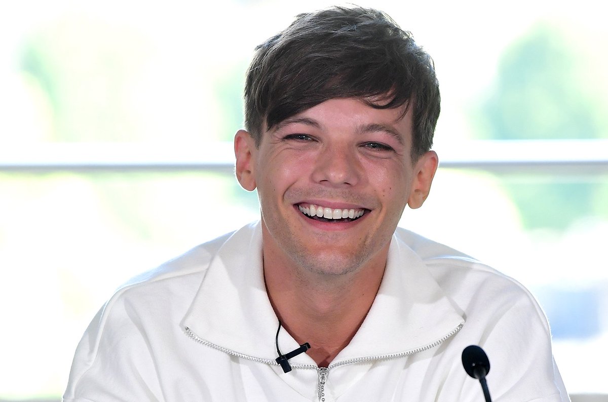 billboard's tweet photo. Louis Tomlinson races to help "X Factor" singer Tommy Ludford after he falls off stage https://t.co/ffskzLxfYM https://t.co/PA2iS67uQf
