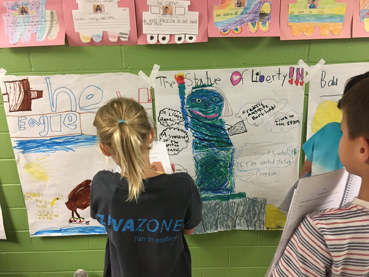 2nd graders <a href="/Ashlawneagles/">Ashlawn Eagles</a> researched American symbols and made posters to show what they learned.  Here they are participating in a gallery walk to learn from other people’s posters. <a href="/StatueEllisNPS/">Statue of Liberty NM</a> #baldeagle #washingtonmonument