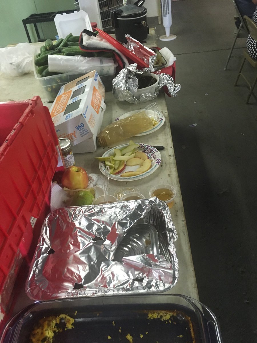 Coop board members and managers at meeting tonight enjoying potluck supper.
