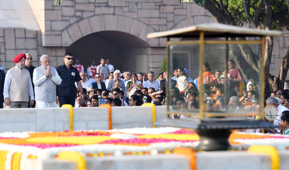 narendramodi's tweet photo. The noble thoughts of Mahatma Gandhi have given strength to millions across the world. He was a stalwart who lived for others and to make our world a better place. 

Paid tributes to Bapu at Rajghat this morning. #Gandhi150 https://t.co/Ot3kBDVLiv