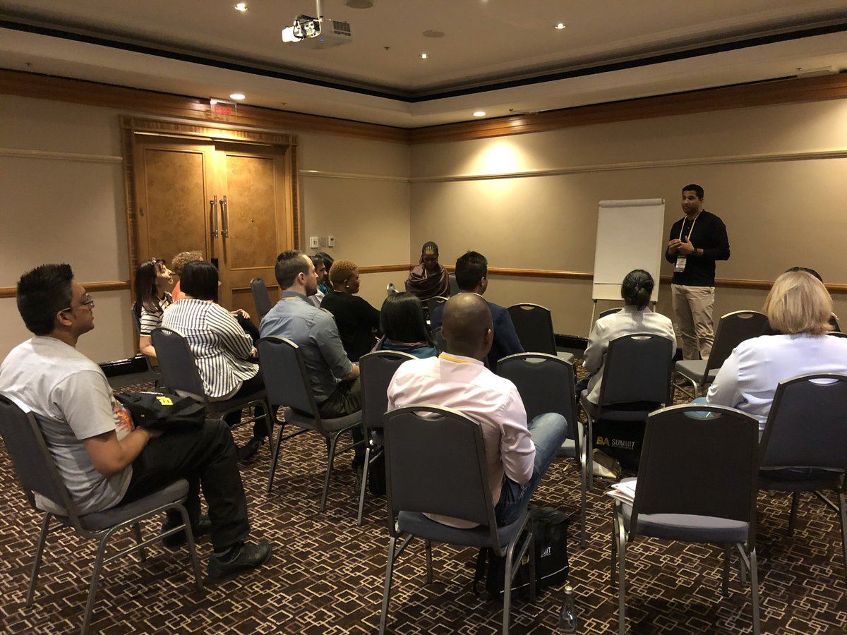 CharleneSeini's tweet photo. Finding your fire! 🔥 @Prian_Reddy captivating the lightning talk group in Room D. @sarabome #BASummitSA https://t.co/xiziUgCOKq