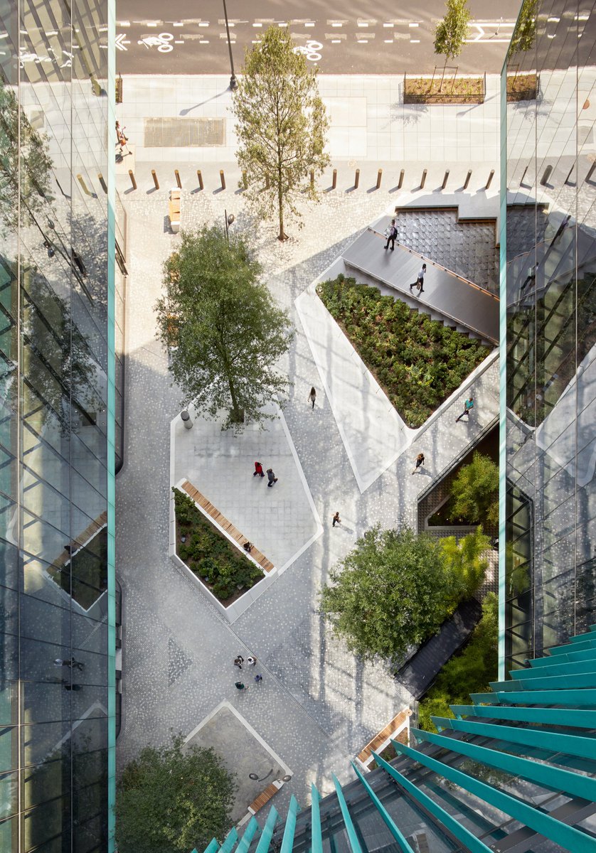 dezeen's tweet photo. Sky bridges criss-cross SHoP's Midtown Center in Washington DC: https://t.co/bVBAEfHT2t https://t.co/b9KKZmuvnK