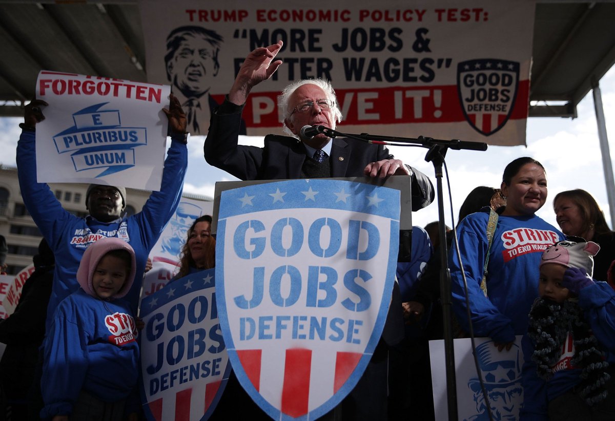 truthout's tweet image. Caving to Pressure From Workers and Bernie Sanders, Amazon Hikes Minimum Wage to $15 an Hour bit.ly/2y8yRlF