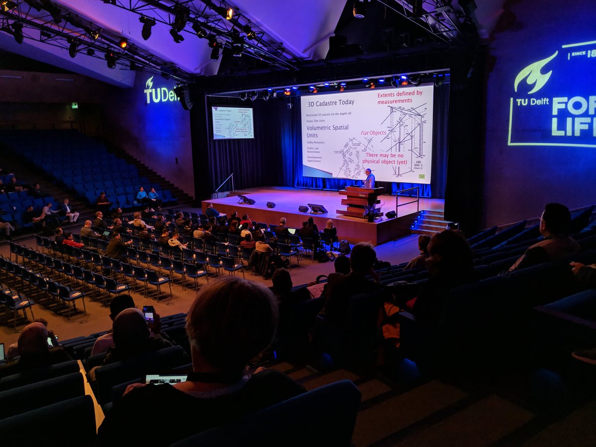 3DDelft2018's tweet photo. Thrilling to hear about 3D cadastres from past, present and future, a keynote delivered by Rod Thompson 🏘️ #geodelft #3Dgeoinfo https://t.co/SIhs6YuRu0