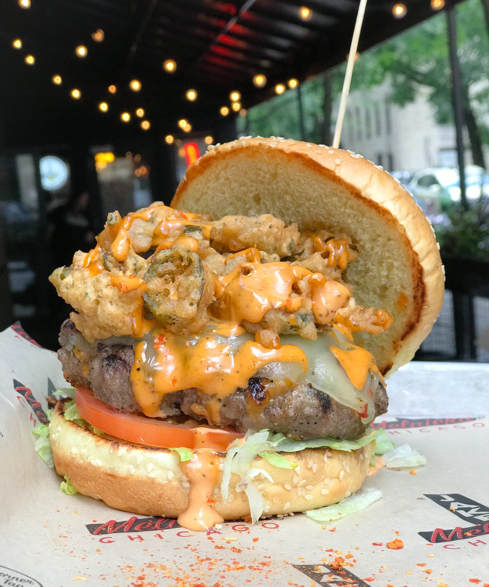 LevyRestaurants's tweet photo. Spooky specials are creeping around the corner @jakemelnicks this month, like the Nightmare on Superior Street, a habanero and cheddar cheese hand-packed beef patty topped with crispy jalapeño bottle caps, pepper jack cheese, XXX mayo, and ghost pepper dust #jakemelnicks https://t.co/IGiST2lNwF