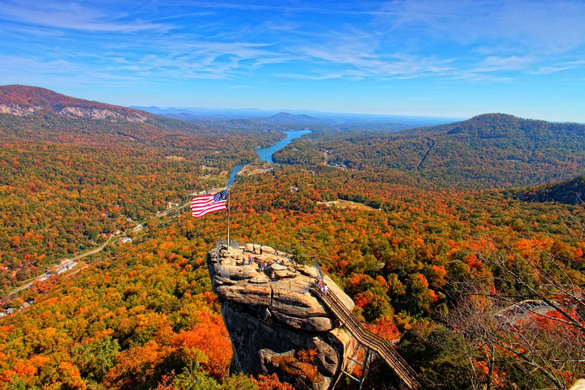 GatesflgSouth's tweet photo. #Fall is the perfect time of year to get outside and explore America's natural beauty; what's your favorite autumn hike? (Pictured: Chimney Rock, NC) #america #flag #hike #foliage https://t.co/sbNTtNBGrO
