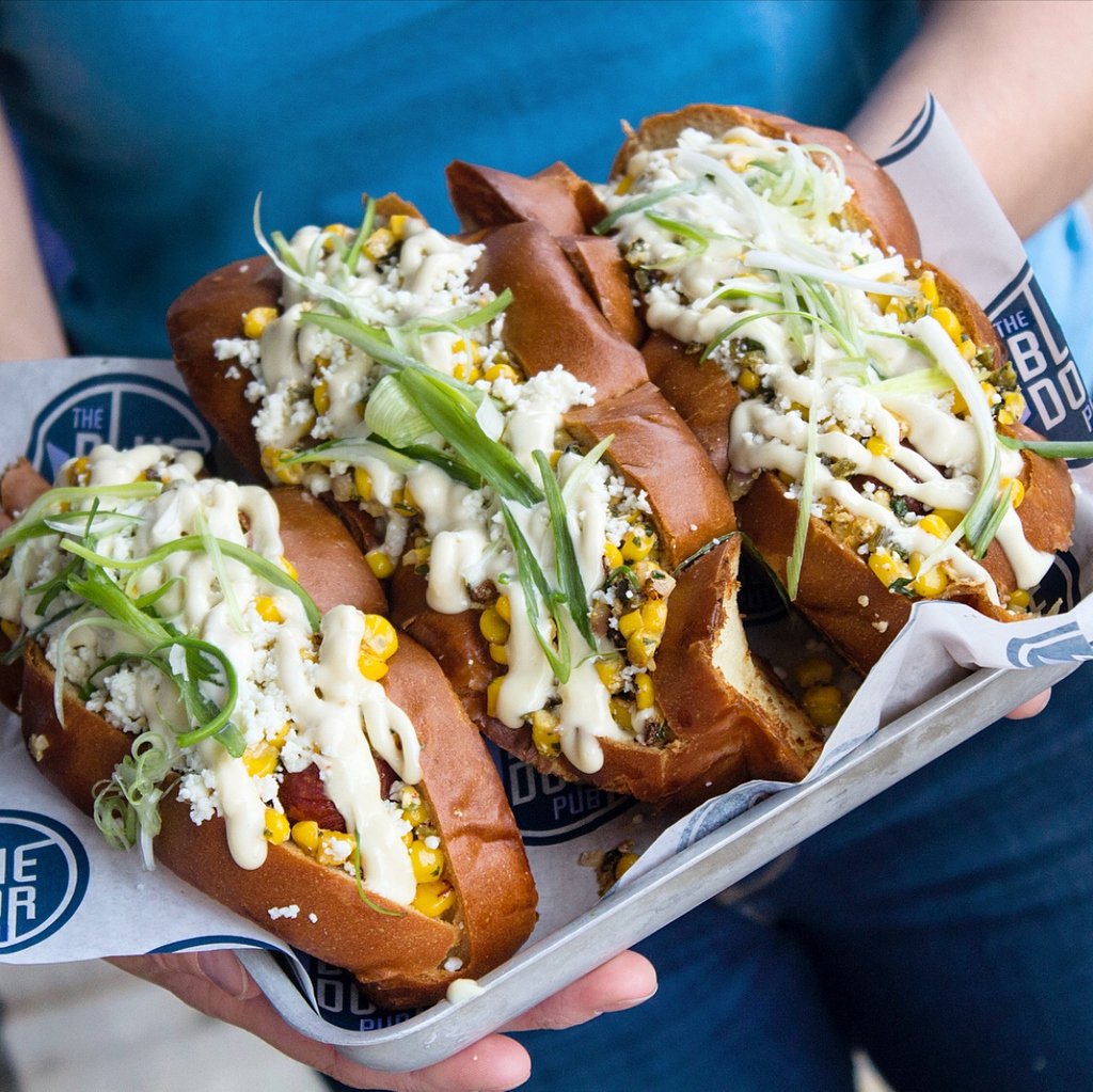 bluedoorpub's tweet photo. Dogs for days... ๐ค๐ญ Check out our current Blue du Jour, the 'Sup Dog: 1/4 lb hot dog on Texas toast bun โข garlic aioli โข corn salsa โข cotija cheese #bluedoorpub
.
Now available daily in #stpaul, #longfellow, & on #comoave. Tuesdays only in #lynlake. https://t.co/2n7XAVBJya