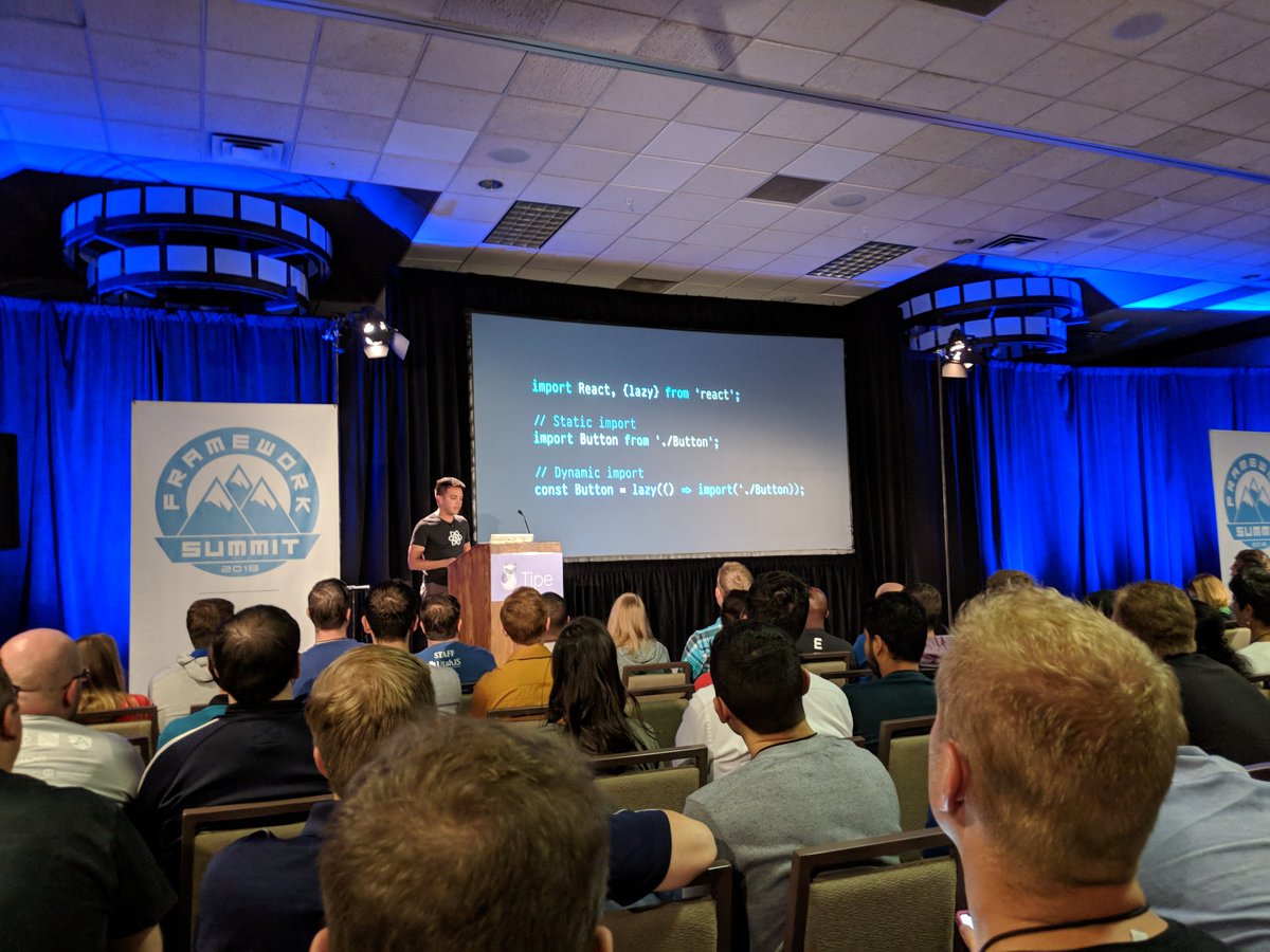 Andrew Clark on stage at Framework Summit showing how React.lazy works
