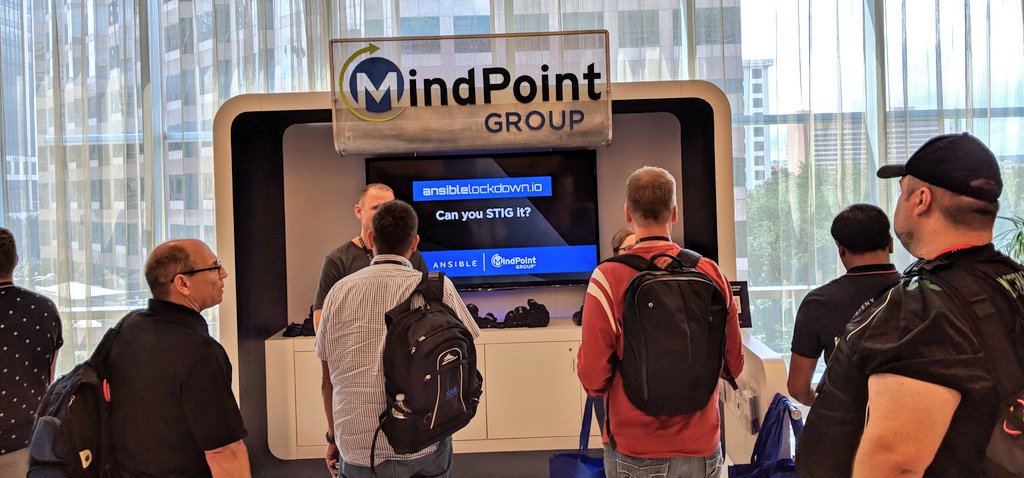 TheMaxamillion's tweet photo. Come talk to the @MindPointGroup here at AnsibleFest Austin 2018 in the 3rd floor partner pavilion. #Ansible #AnsibleFest #SecurityThroughAutomation https://t.co/kCQMdTnRWe