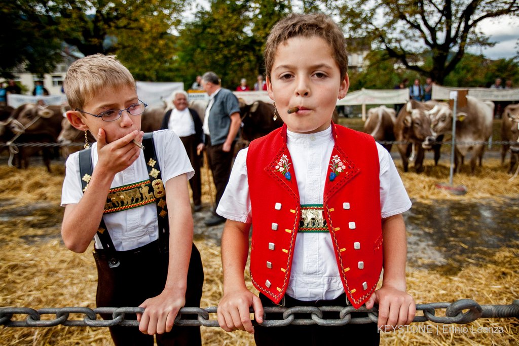 swissinfo_en's tweet photo. Visitors to the cattle fairs held this time of year in eastern Switzerland may be amazed to discover young children legally lighting up cigarettes, cigars and pipes. https://t.co/OxaXtEhbpN