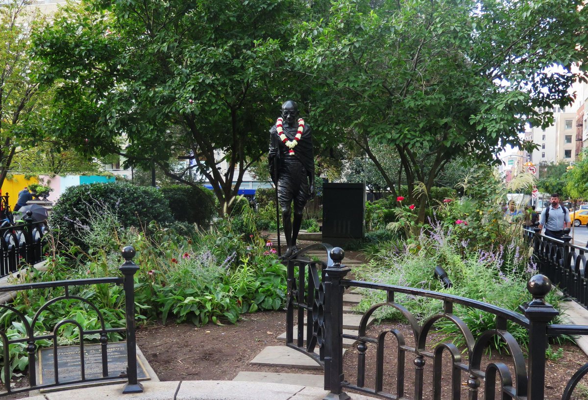 NYCParks's tweet photo. "My optimism rests on my belief in the infinite possibilities of the individual to develop nonviolence. ... In a gentle way you can shake the world." - words engraved at the @UnionSquareNY statue of Mahatma Gandhi who was born on this day in 1869. #DayofNonViolence https://t.co/MFMxY2ArIM
