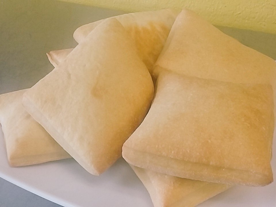 Fresh ciabatta out of the oven!   Only $3 a bag.  Slice in half for sandwich nirvana.