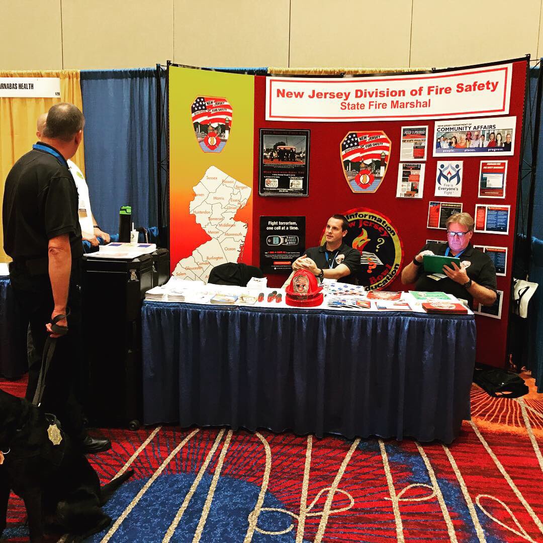 NJDCA's tweet photo. Meet Ashes, our Division of Fire Safety arson dog. Come visit him at the Division booth at the Governor's Conference on Housing and Economic Development today and tomorrow! @NJGov @NJGovNews #NJGOVCONF https://t.co/ZxeVDJMtbK