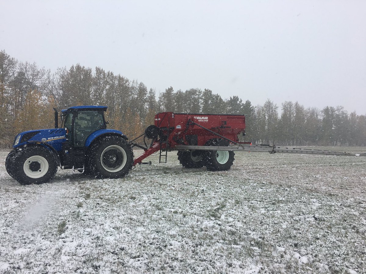 Can’t combine. Decided to try spreading fertilizer in the snow on the hay land.