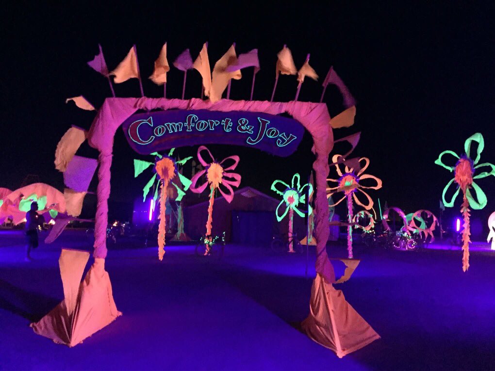 comfort_and_joy's tweet photo. Blacklight art at #BurningMan ~ #BlackRockCity #InDustWeTrust #ThemeCamp #BurningManPhotos #playapics #dailyburnpics #gayburners https://t.co/WpuhkAfuP7