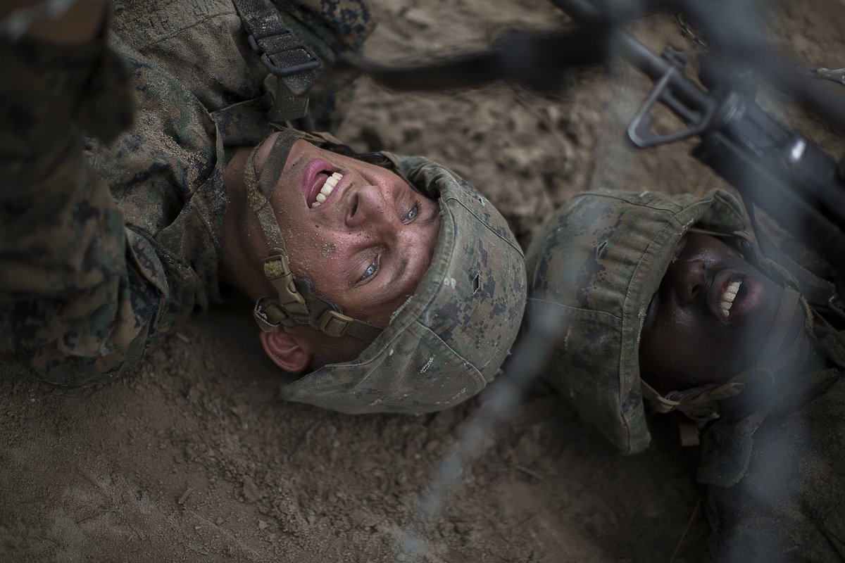 Recruit Douglas Wright lifts a concertina wire so that Recruit Jovan Jones can crawl underneath during Basic Warrior Training, designed to teach the importance of teamwork under stress.

For more information, text THEFEW to 43506. 

#MARINES #USMC #1ST_MCD