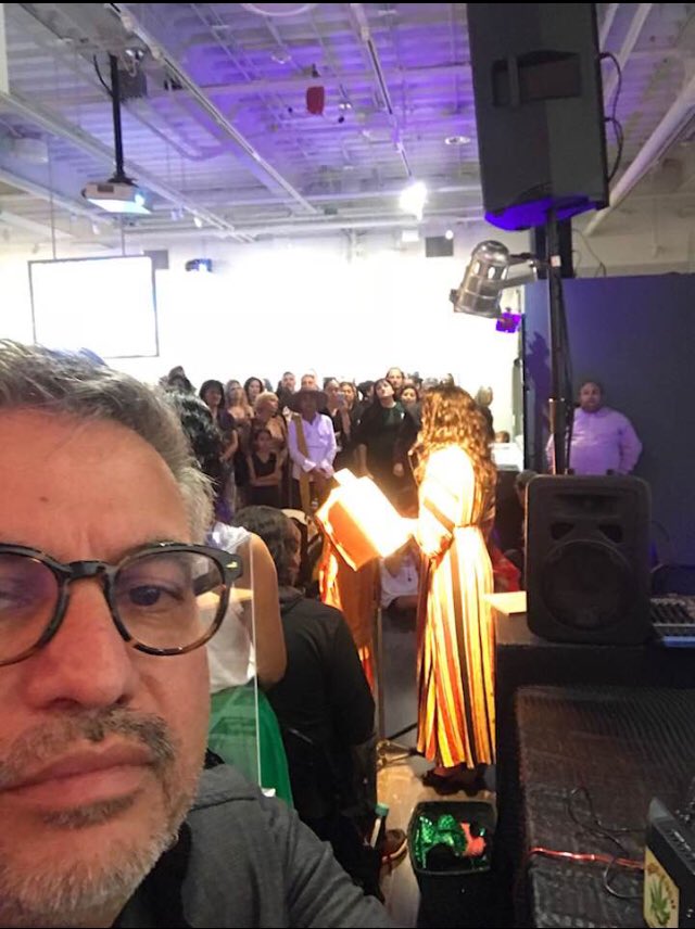 aida_writes's tweet photo. That time when your pal, #JoeCepeda took a selfie and you were reading your grown up work in a museum in the background. #homies https://t.co/pLRly0nGIW