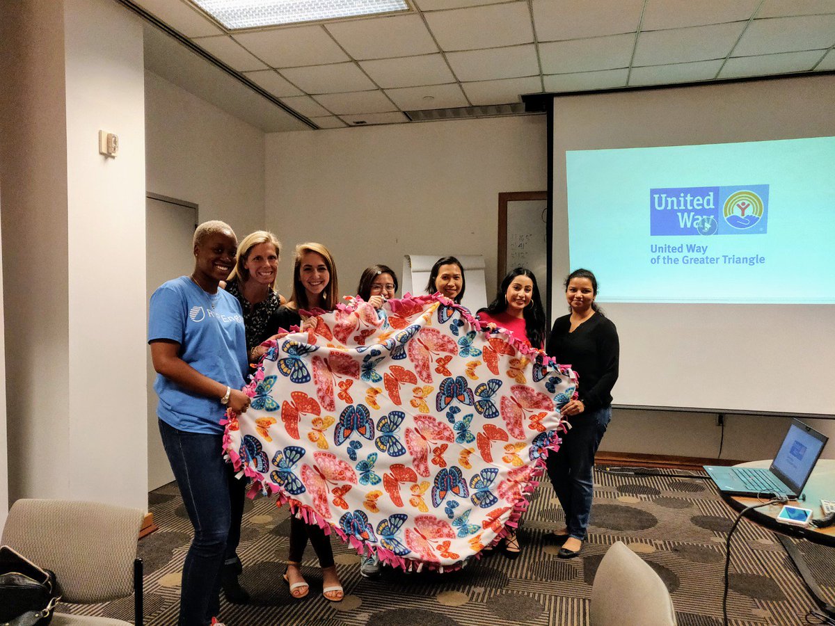 UWTriangle's tweet photo. IBM volunteers making the 'no sew' blankets for @SAFEchildNC This initiative was organized through the #IBM- ECCC initiative. Thank you @IBM #ibmrtpcares #IBMRTP https://t.co/42AJBf23r7