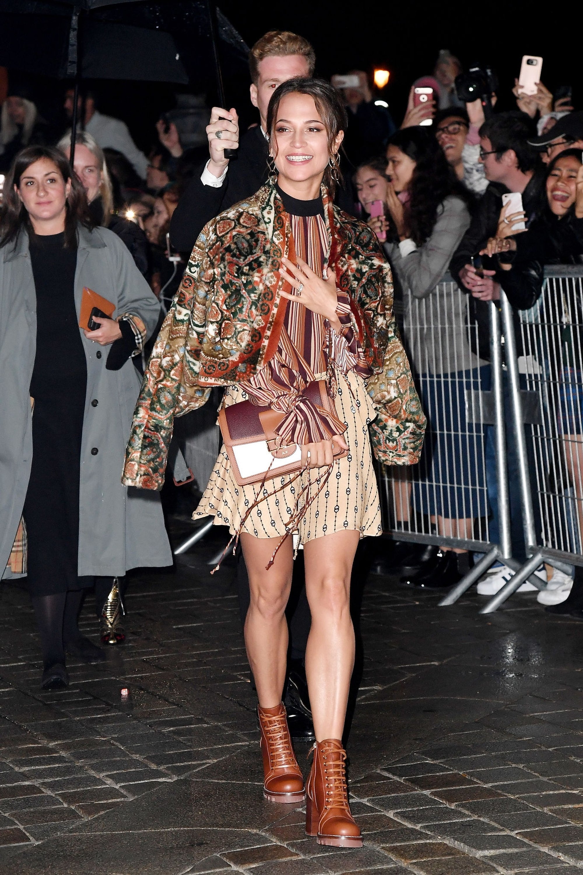 Alicia Vikander arrives at the Louis Vuitton show during