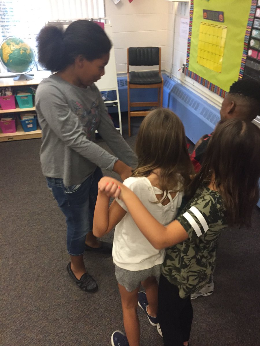 Ms_Strahan's tweet photo. We used cooperation and growth mindset during our Morning Meeting activity: human knots! https://t.co/kY9oH5mBjR