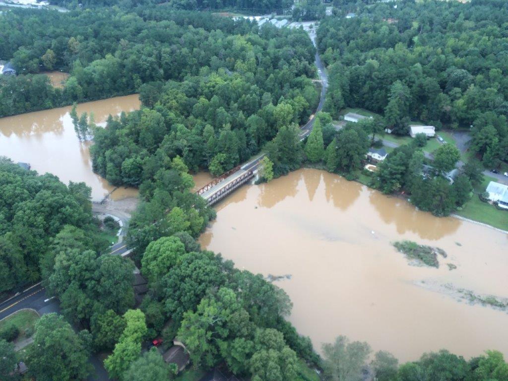 LCSD_News's tweet photo. We can’t believe it’s been three years since the #SCFlood. These pictures will always serve as reminders of the losses endured, but also the resiliency and strength shown across Lexington County and South Carolina.

#LESM #LCSDnews https://t.co/2tv7SPl914