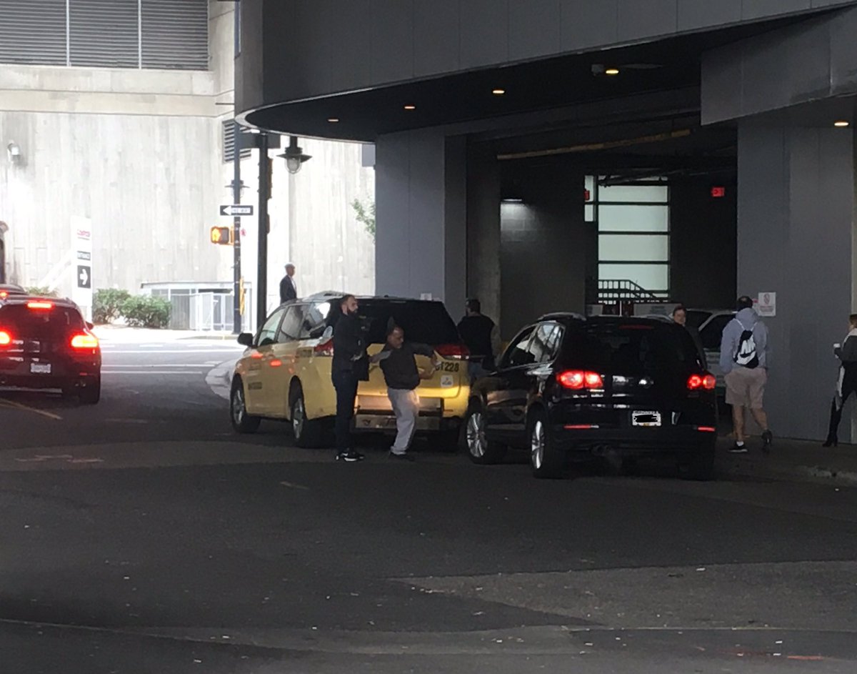 PaulHaysom's tweet image. And now a taxi carrying different @NHLFlames players just backed into a car. Take this to mean whatever you want about the #Flames or #Canucks season... #RoughStart #NHL