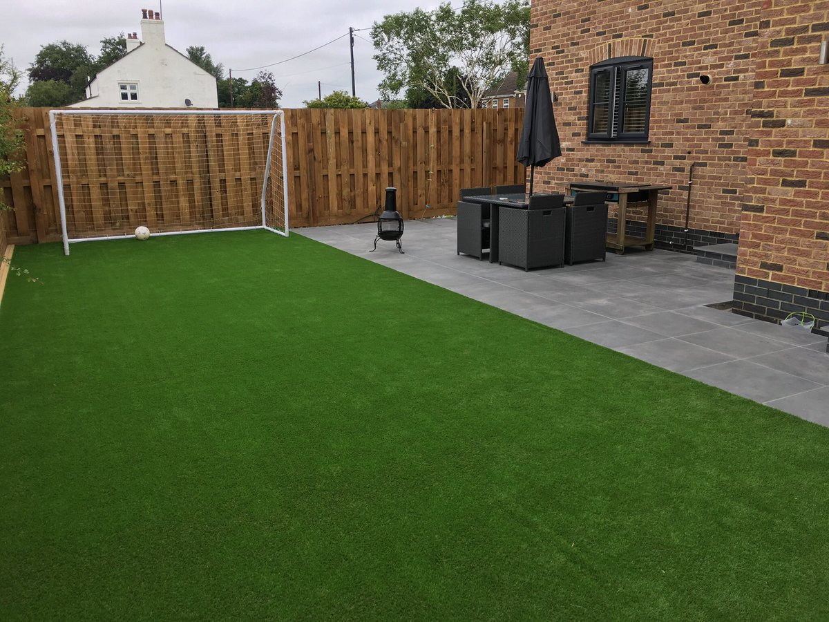 Here’s a nice bit of artificial grass &amp; porcelain paving we have installed this summer