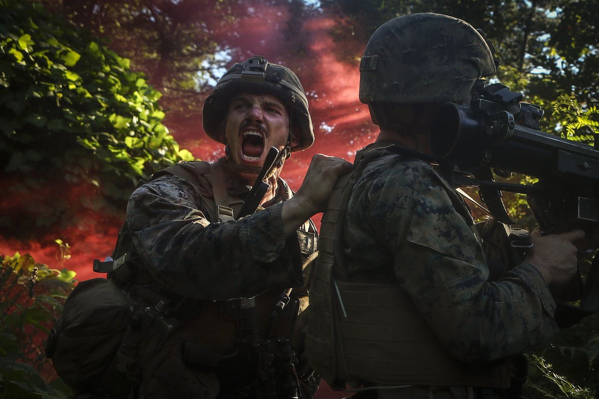 U.S. Marine Corps 1st Lt Harry J. D. Walker communicates with his platoon while taking simulated fire during a training exercise. Photo by Marine photojournalist Sgt Aaron Patterson. 

For More Information, Text THEFEW to 43506.

#1st_MCD #Marines #semperfi #Usmc