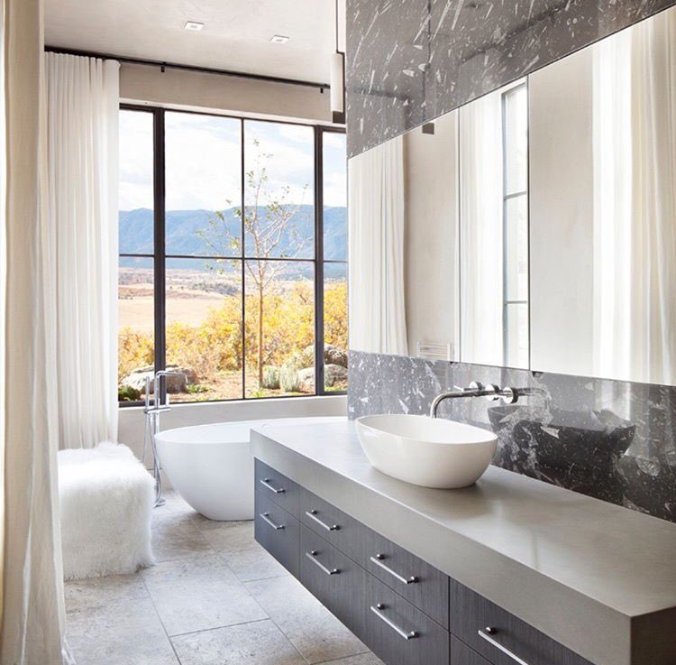 verticalarts's tweet photo. This beautiful #bathroom features a his and her split #vanity which gives them both a view to outside! The integrated @Robern medicine cabinets add hidden extra storage! #interiordesign #steelwindows #modern #bathroomdecor #VAdesigns https://t.co/WfoLGpxgGU