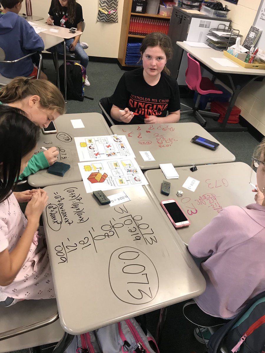 Math, Math Everywhere!  Playing a little board game to practice dividing decimals🎲!  #WeAreReynolds #MiddleSchoolMath #writingondesksismorefun