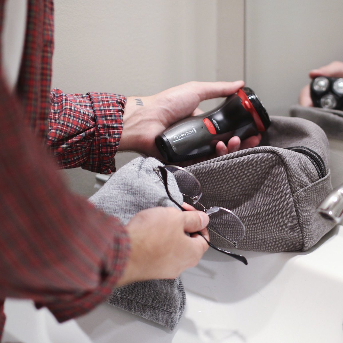 fall travel essentials — glasses, beanie, flannel and @remingtonready to keep me fresh #OutDoTheDay #ad