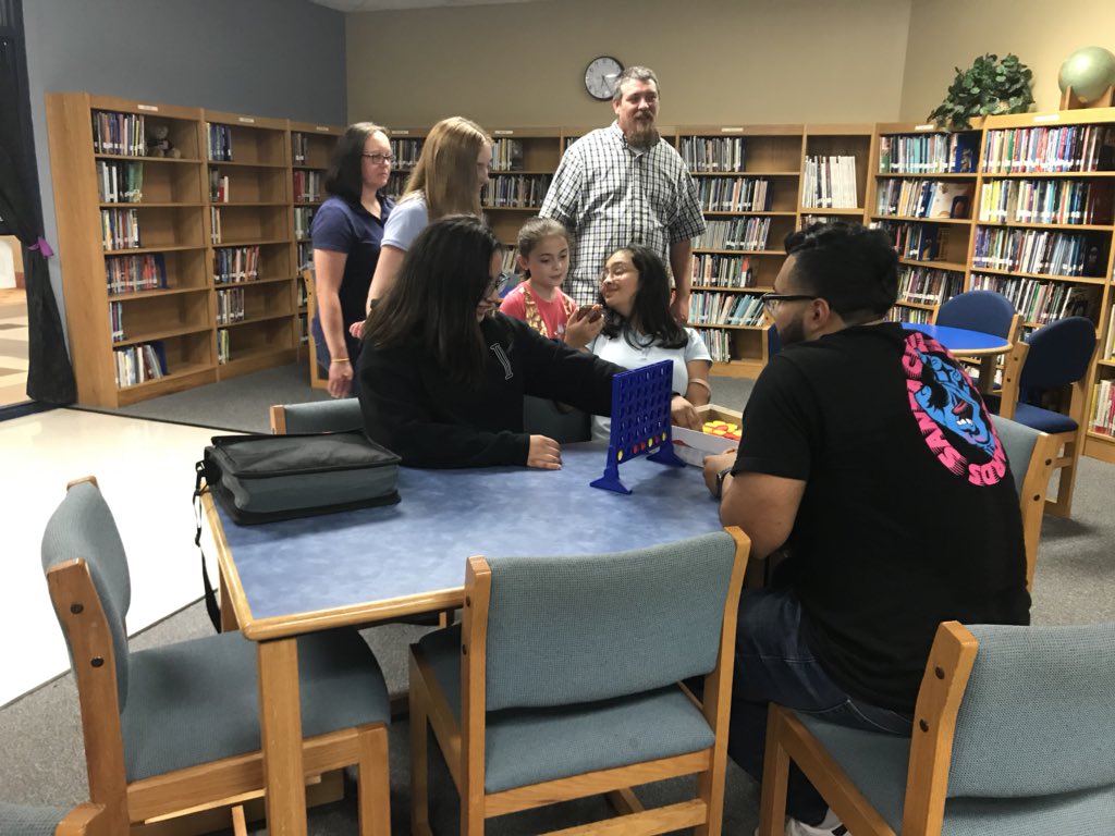 LibrarianJonesy's tweet photo. Meet the Teacher was a success! @MsOkafor is the reigning Guess Who champ! #watchout #AgnewGRIT #Agnewlibrary #MISDLibraries https://t.co/fyfoOLqOPg
