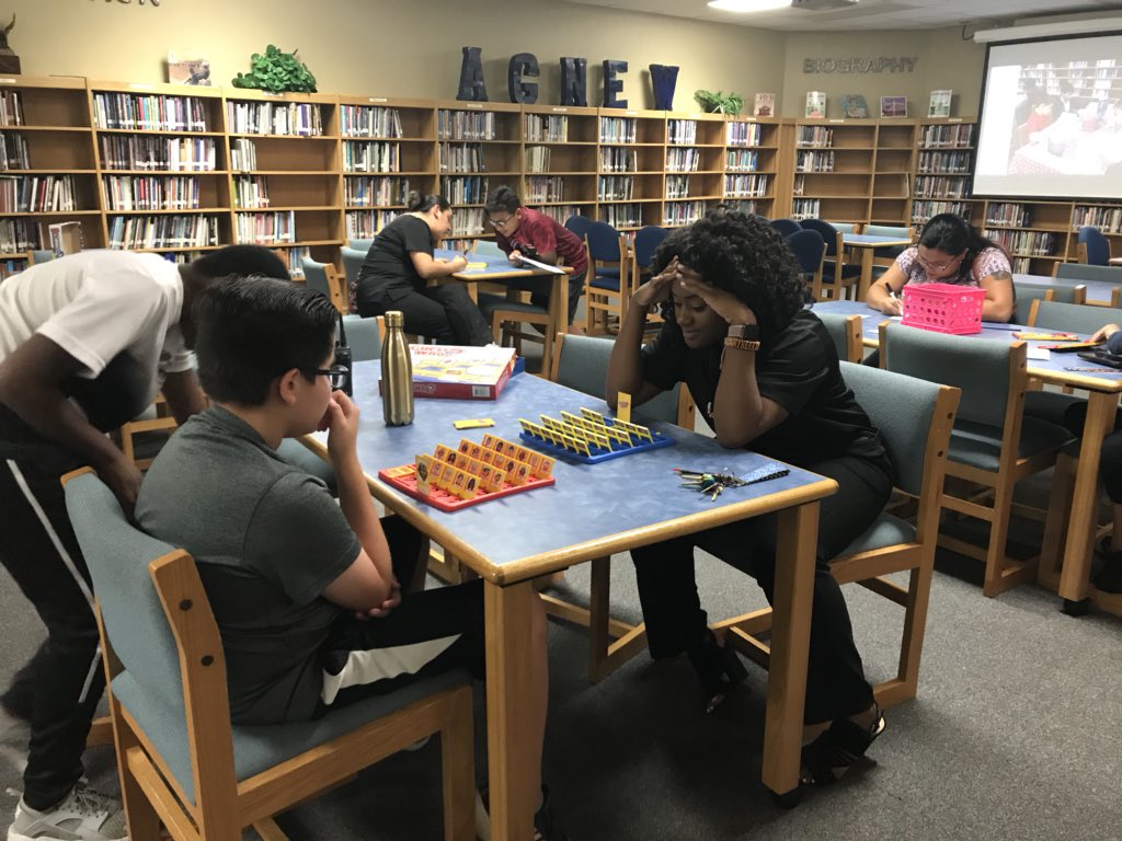 LibrarianJonesy's tweet photo. Meet the Teacher was a success! @MsOkafor is the reigning Guess Who champ! #watchout #AgnewGRIT #Agnewlibrary #MISDLibraries https://t.co/fyfoOLqOPg