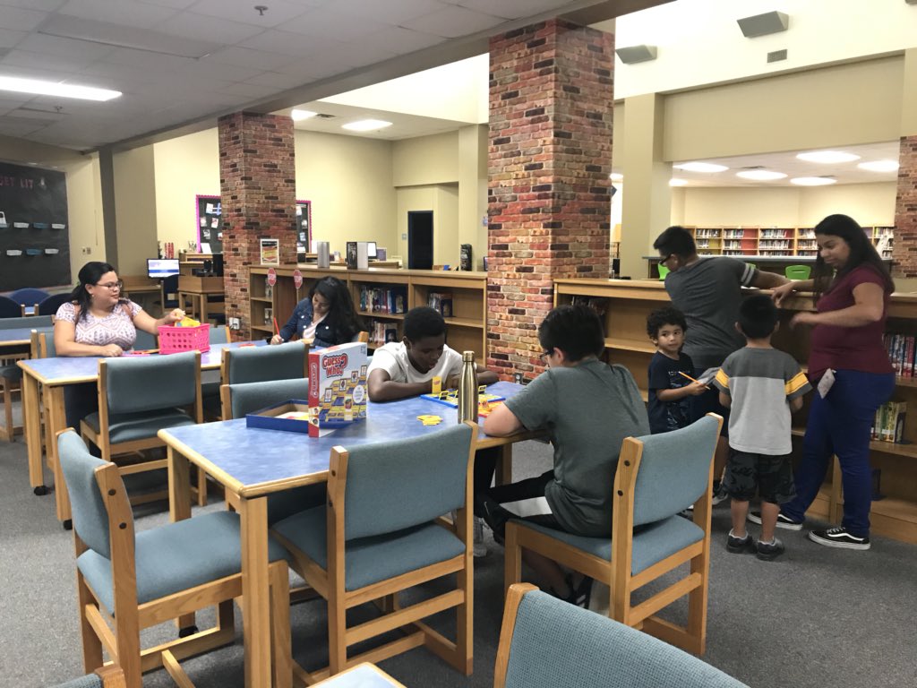 LibrarianJonesy's tweet photo. Meet the Teacher was a success! @MsOkafor is the reigning Guess Who champ! #watchout #AgnewGRIT #Agnewlibrary #MISDLibraries https://t.co/fyfoOLqOPg