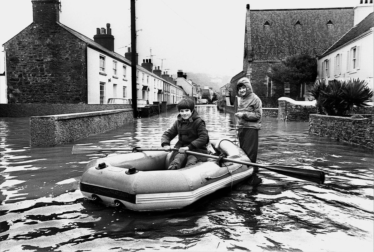 A storm hit the Island on 19 February 1978. Despite the damage, these youngsters saw the chance for a bit of fun and took to the newly created ‘sea’ in Gorey Village. #TBT