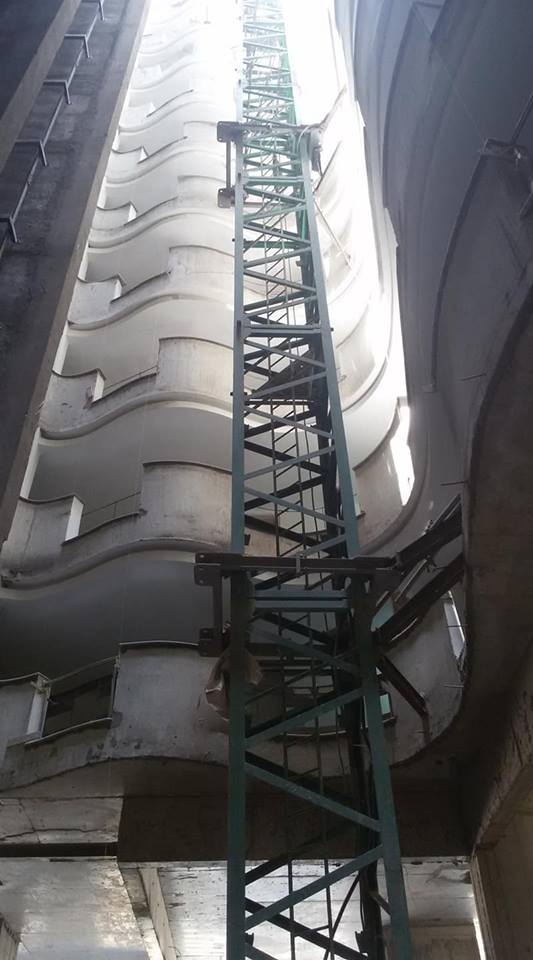 InfoSutherland's tweet photo. The atrium at Capital M Apartments, Nairobi, being revealed as scaffolding makes way for the curvy lines of the walkways. #SutherlandEngineers #OptimalEngineering https://t.co/In6gm7EyhG