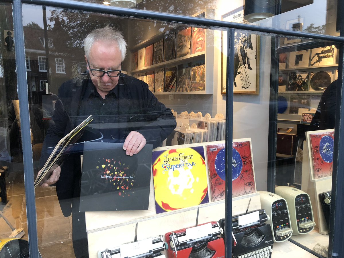 charliecampion's tweet image. Roger preparing Olympic Records #Barnes window for the @TheGBHighSt Rising Star award assessment visit today all vinyl recorded at Olympic Studios with a star theme @thecure @SirTimRice @snowpatrol rogermilesartist.com/www.rogermiles… @TCMBarnes #GBHSBarnes #MyHighStreet @Olympic_Cinema