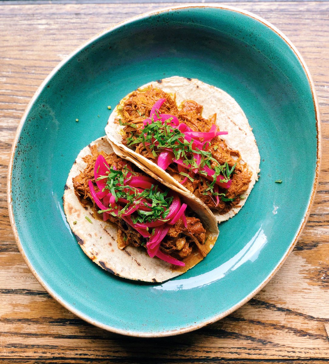 ESqHospitality's tweet photo. Happy National Taco Day from @HorchataNewYork! Treat yourself to their Cochinita Pibil Tacos 🌮 with achiote braised pork, cilantro and habanero pickled onions on corn tortillas. The perfect way to celebrate! https://t.co/nlJRgbD2Bf