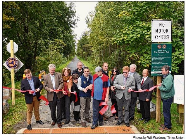 PTNY's tweet photo. PTNY with @NYstateparks @AsmSantabarbara @MontgomeryCoNY @GeorgeAmedore @NYSCanalCorp @NYSDOT helped cut the official ribbon to open the newest section of the #EmpireStateTrail just west of #Schenectady yesterday. Via @timesunion https://t.co/foFwdEoMhk https://t.co/DZoYXCLJUD